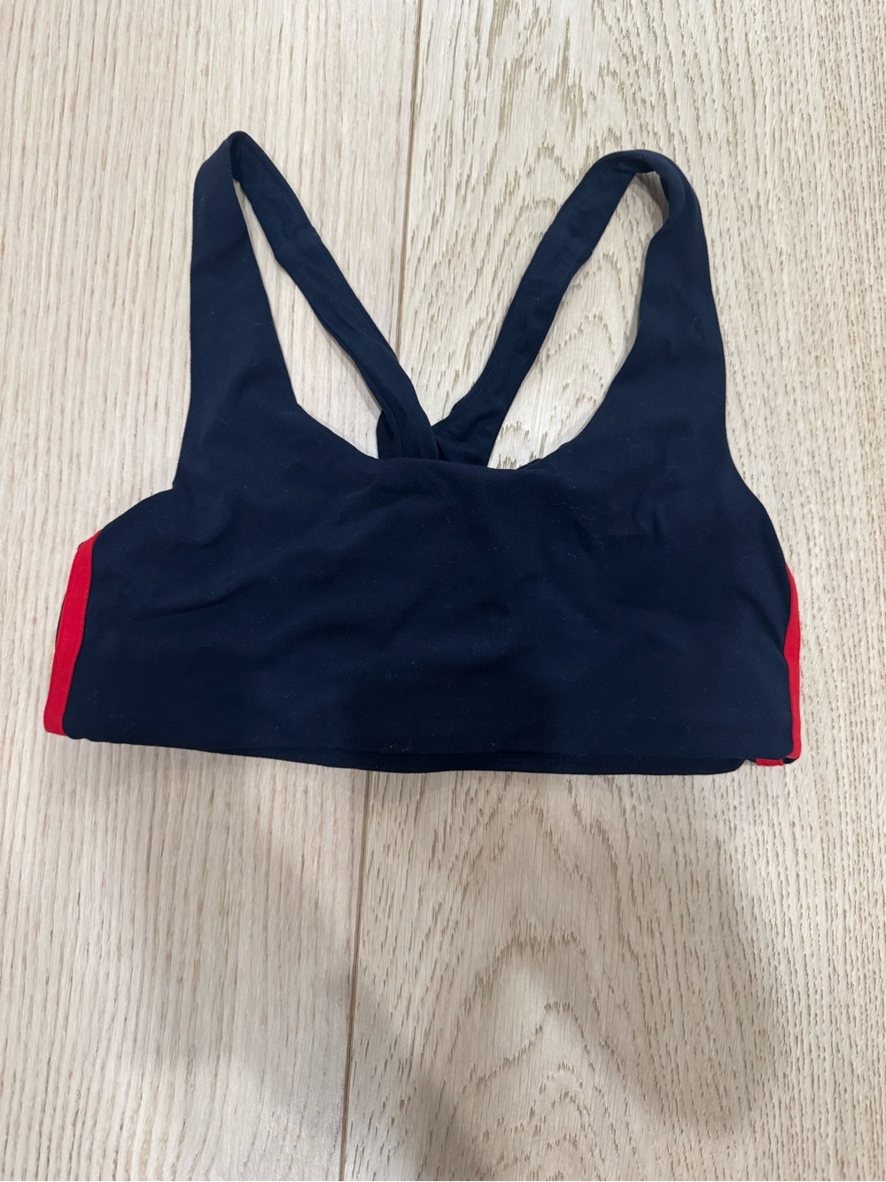 Splits59 Ella Navy Blue Sports Bra with Red Side Stripes